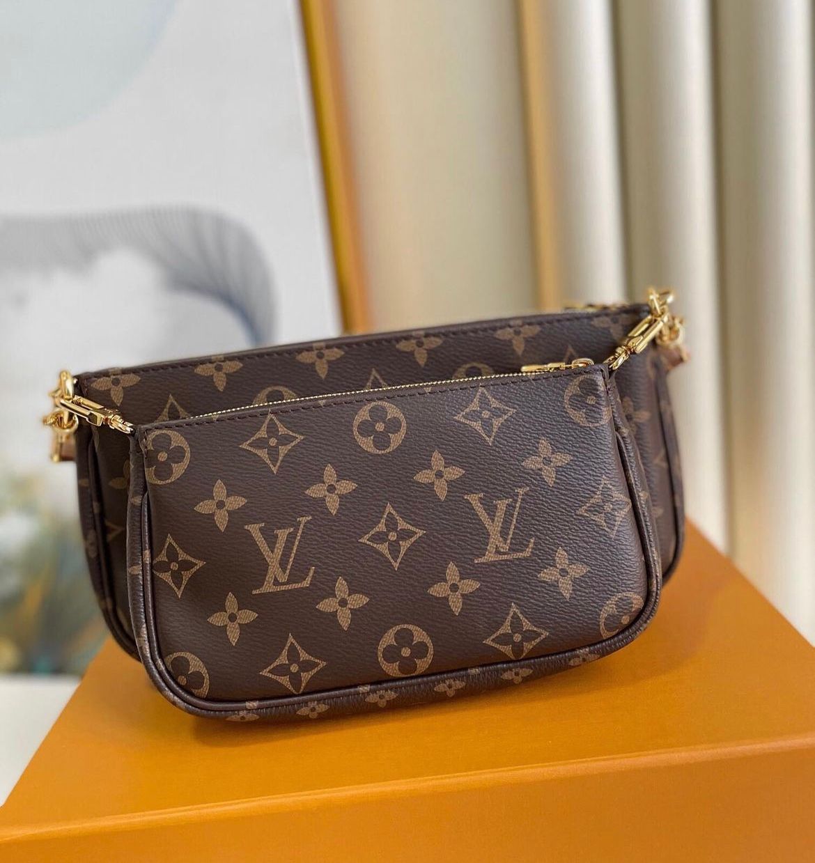 LV MULTI POCHETTE ACCESSOIRES